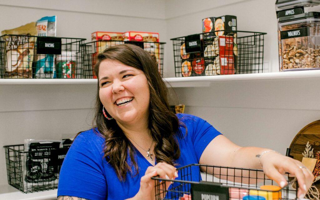 Family assistant organizing a home pantry