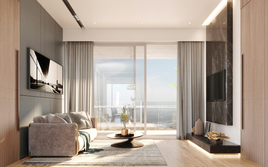 Modern living room with a large window and ocean view