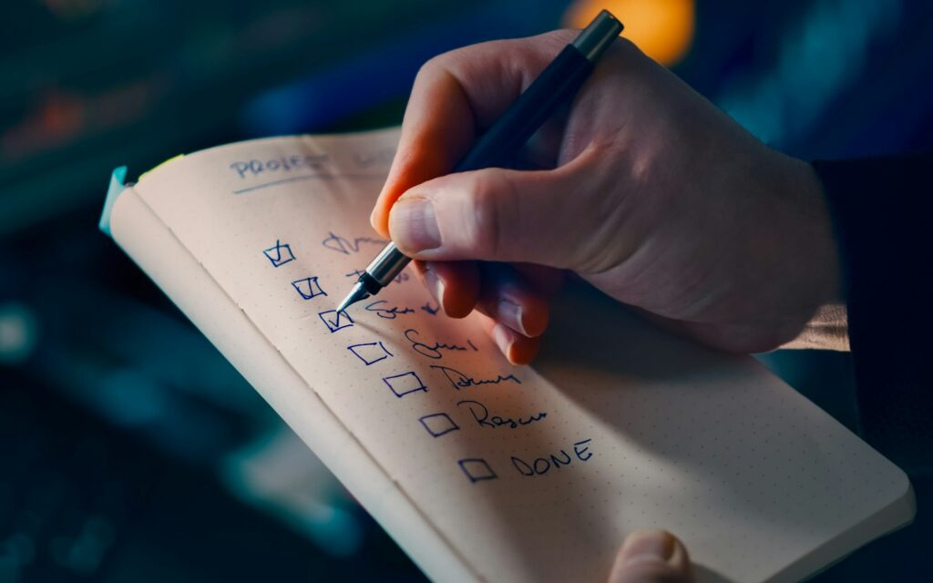 Personal assistant checking off a to-do list
